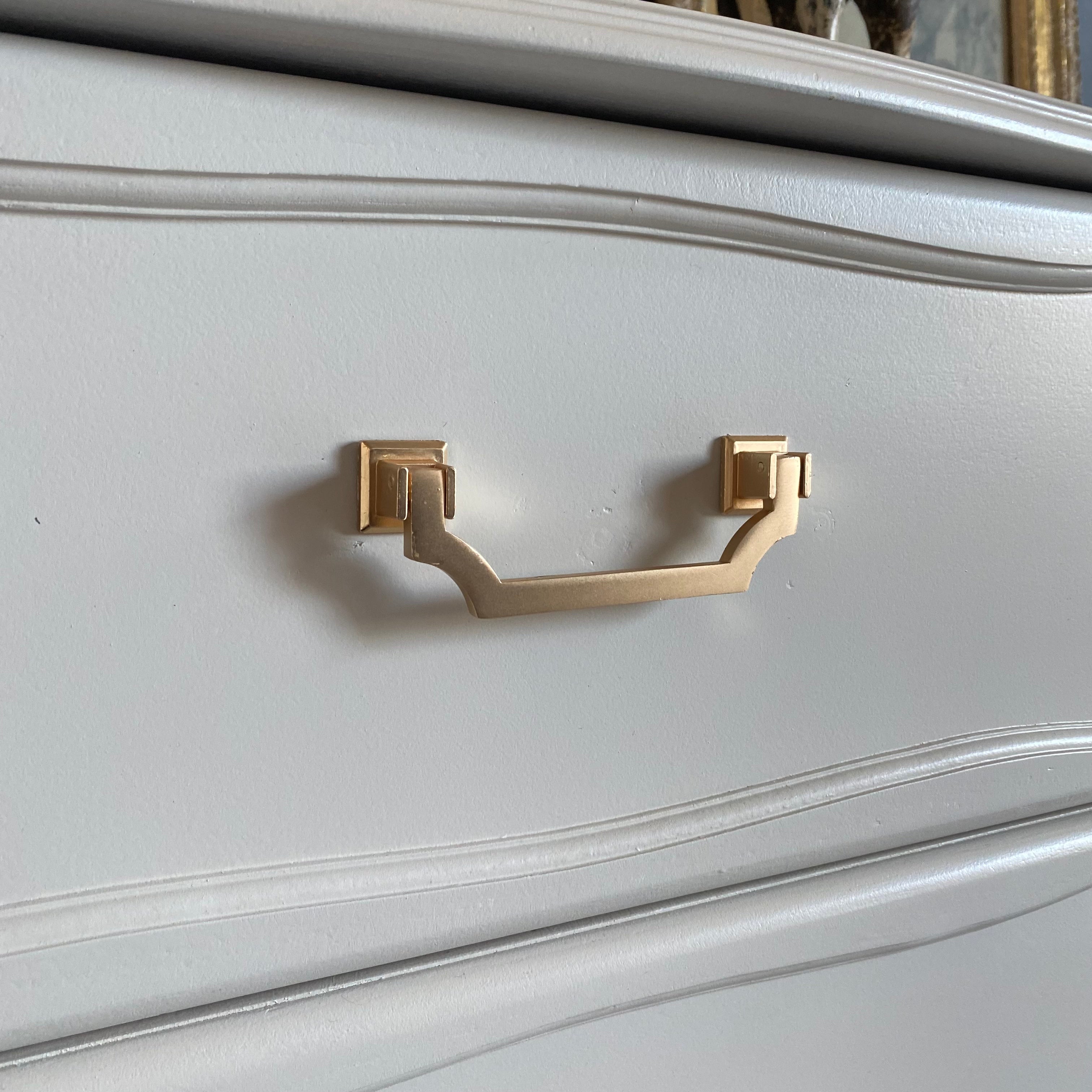 Elegant off-white bedside tables