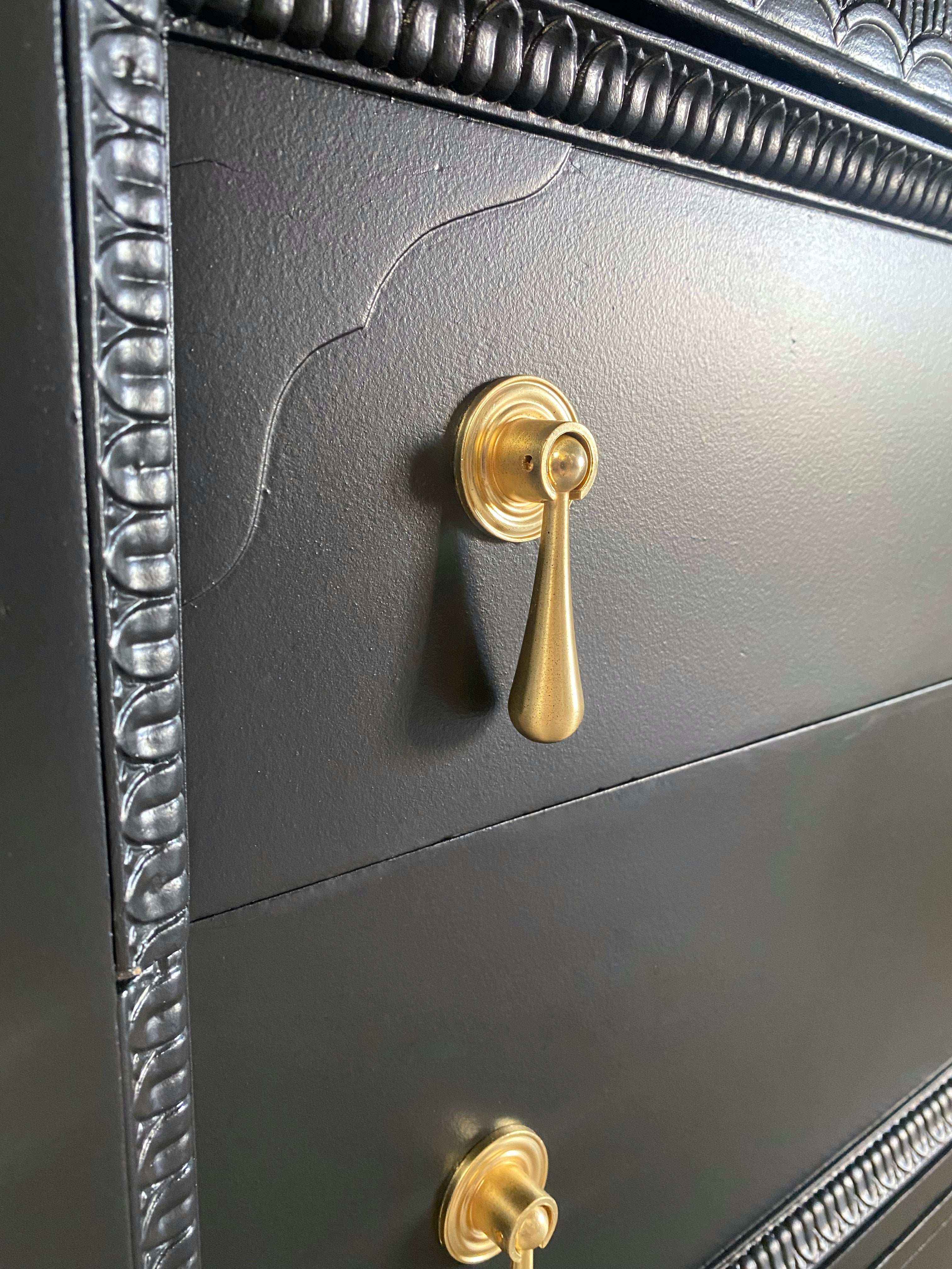 Elegant black sideboard with gorgeous brass drop handles