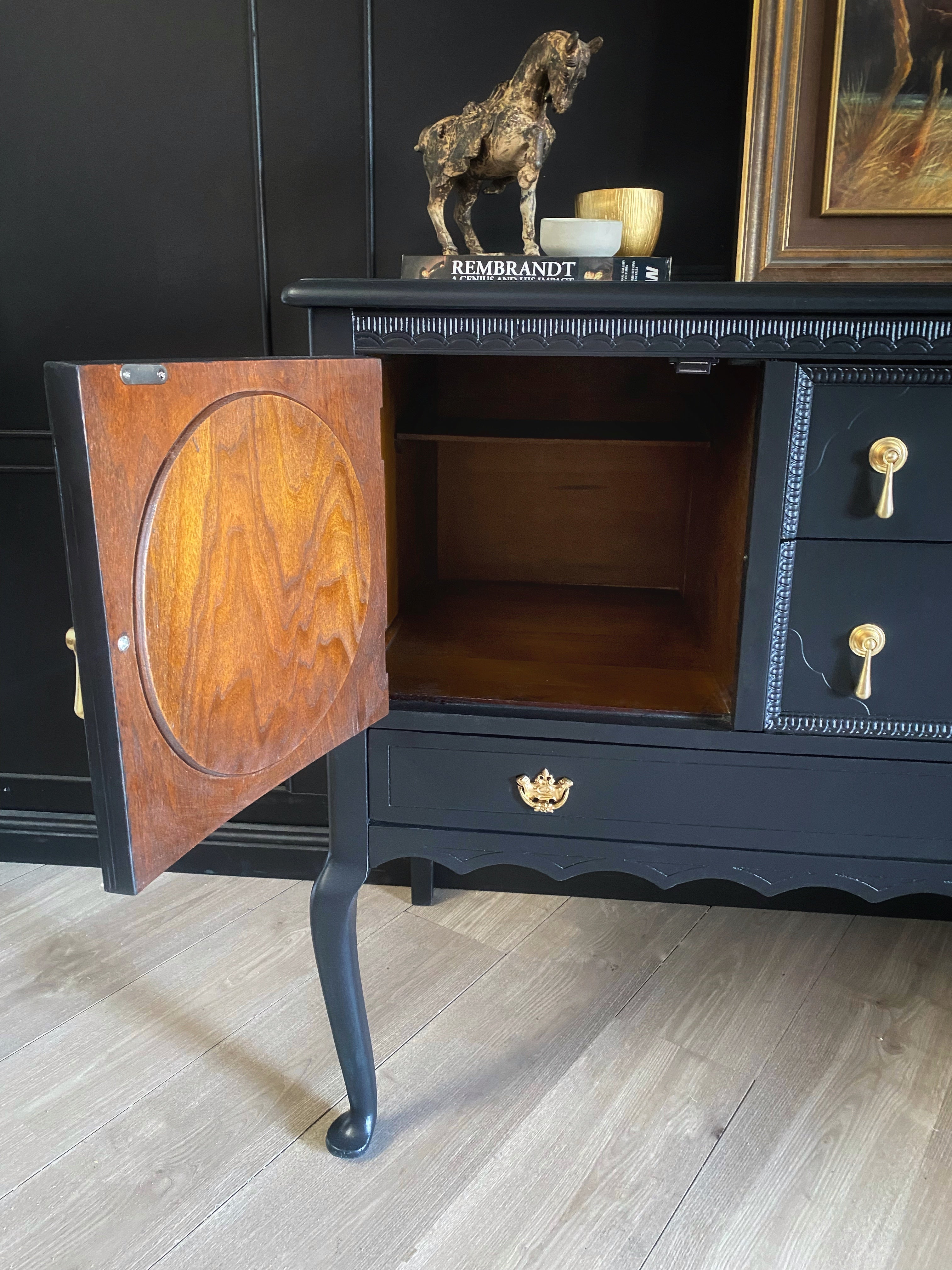 Elegant black sideboard with gorgeous brass drop handles