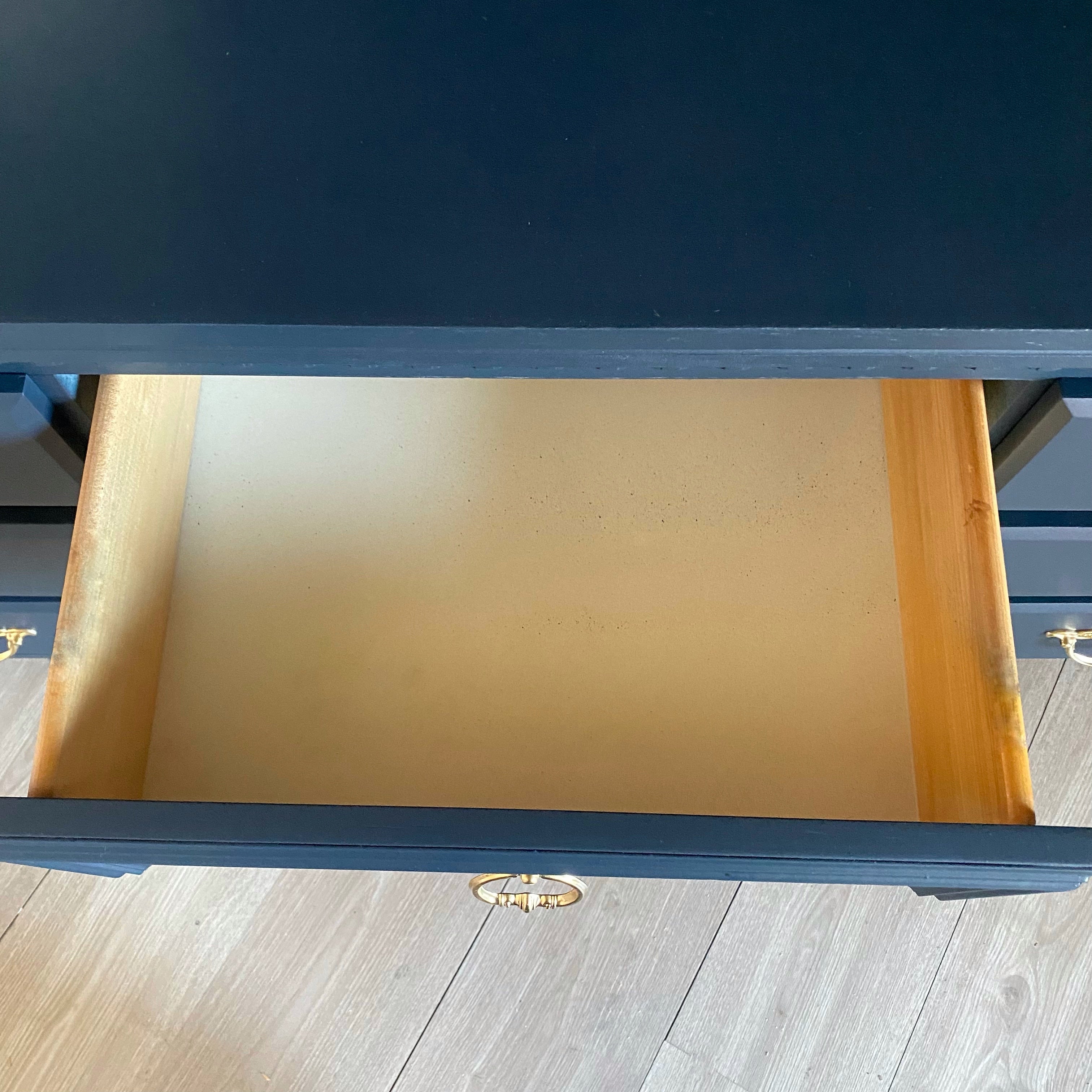 Dark Blue dresser with gold hardware and legs