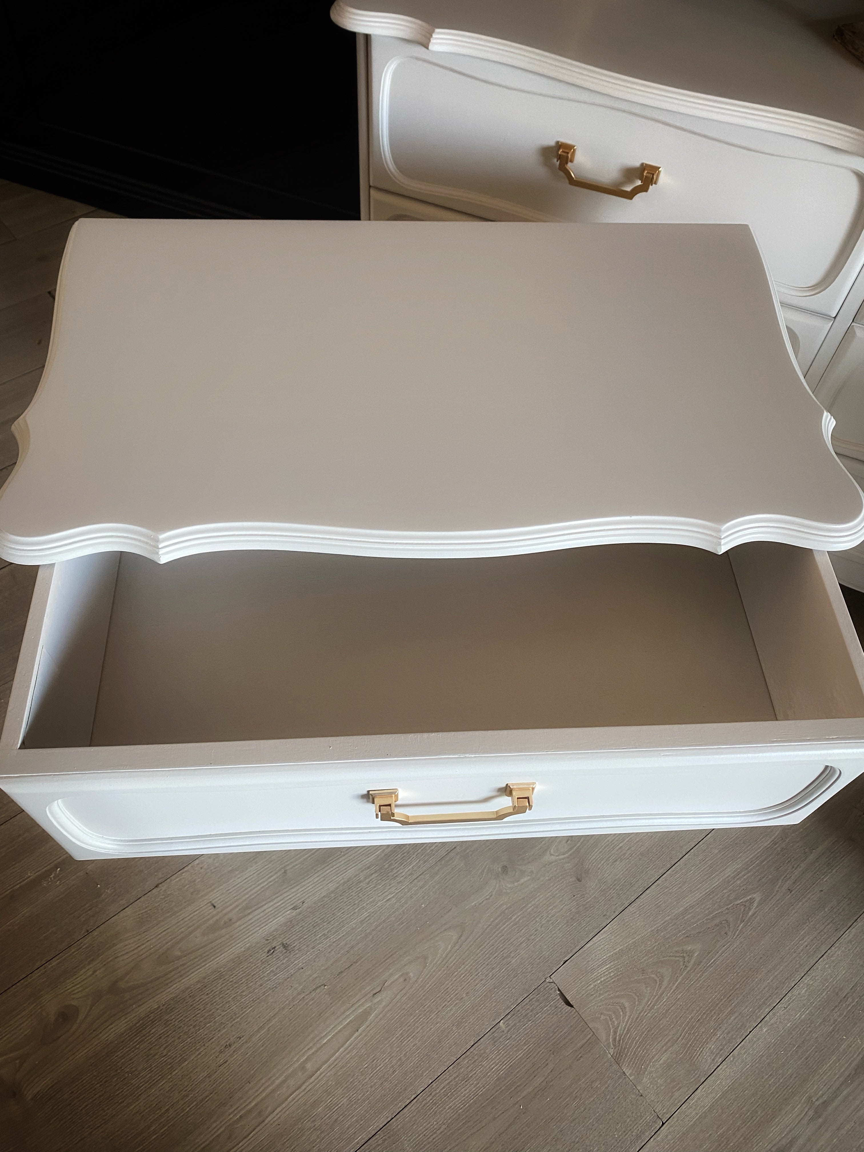 Elegant off-white bedside tables