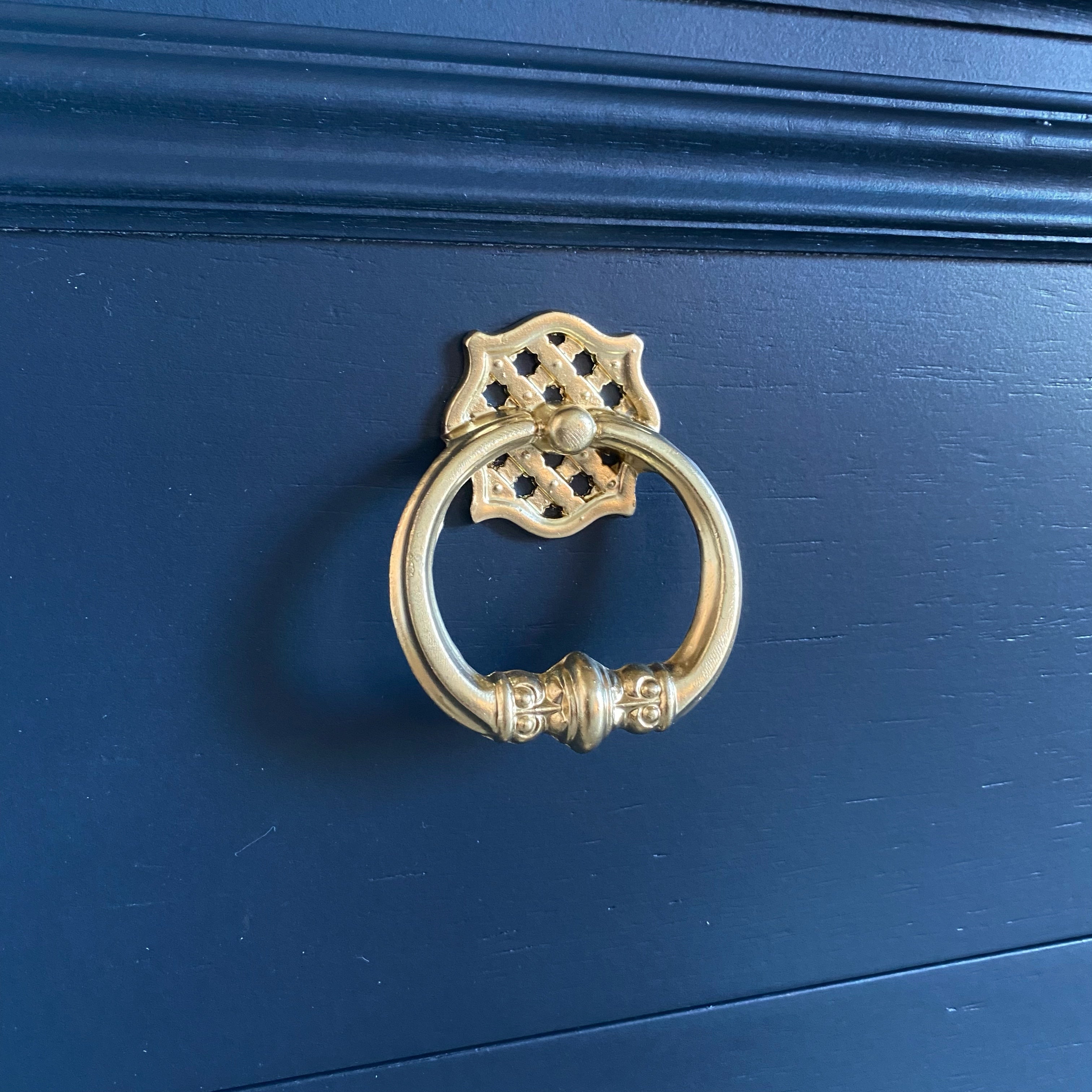 Dark Blue dresser with gold hardware and legs
