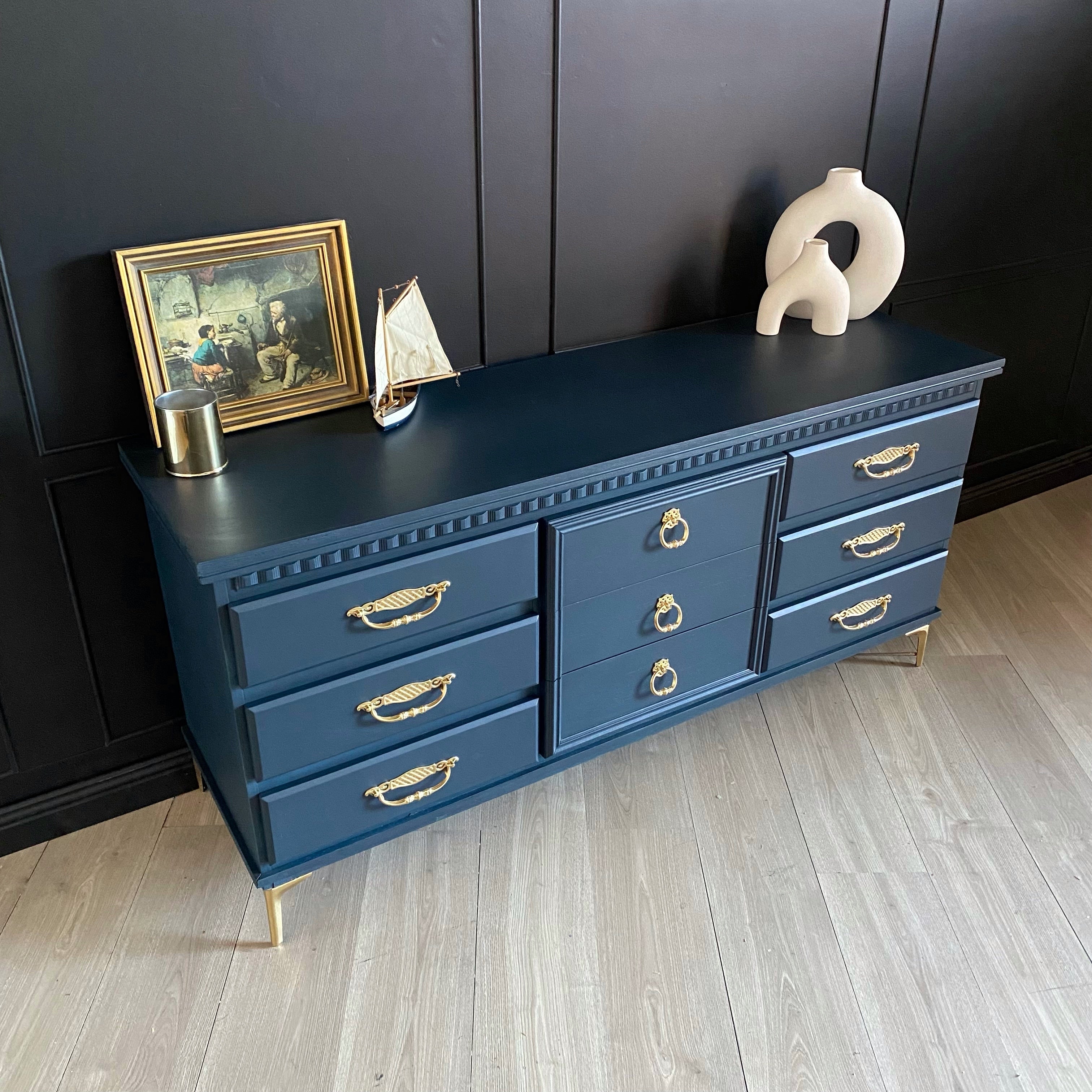 Dark Blue dresser with gold hardware and legs