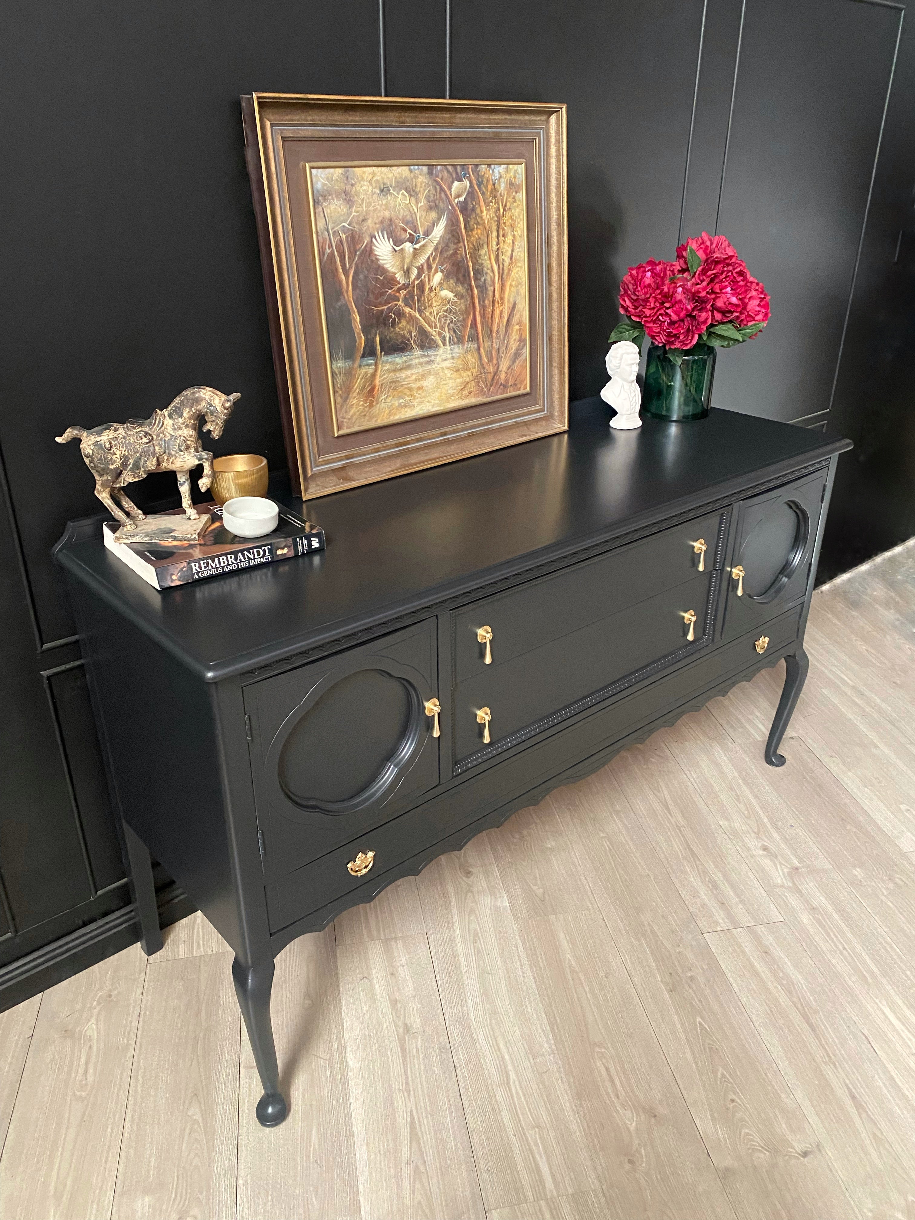 Elegant black sideboard with gorgeous brass drop handles
