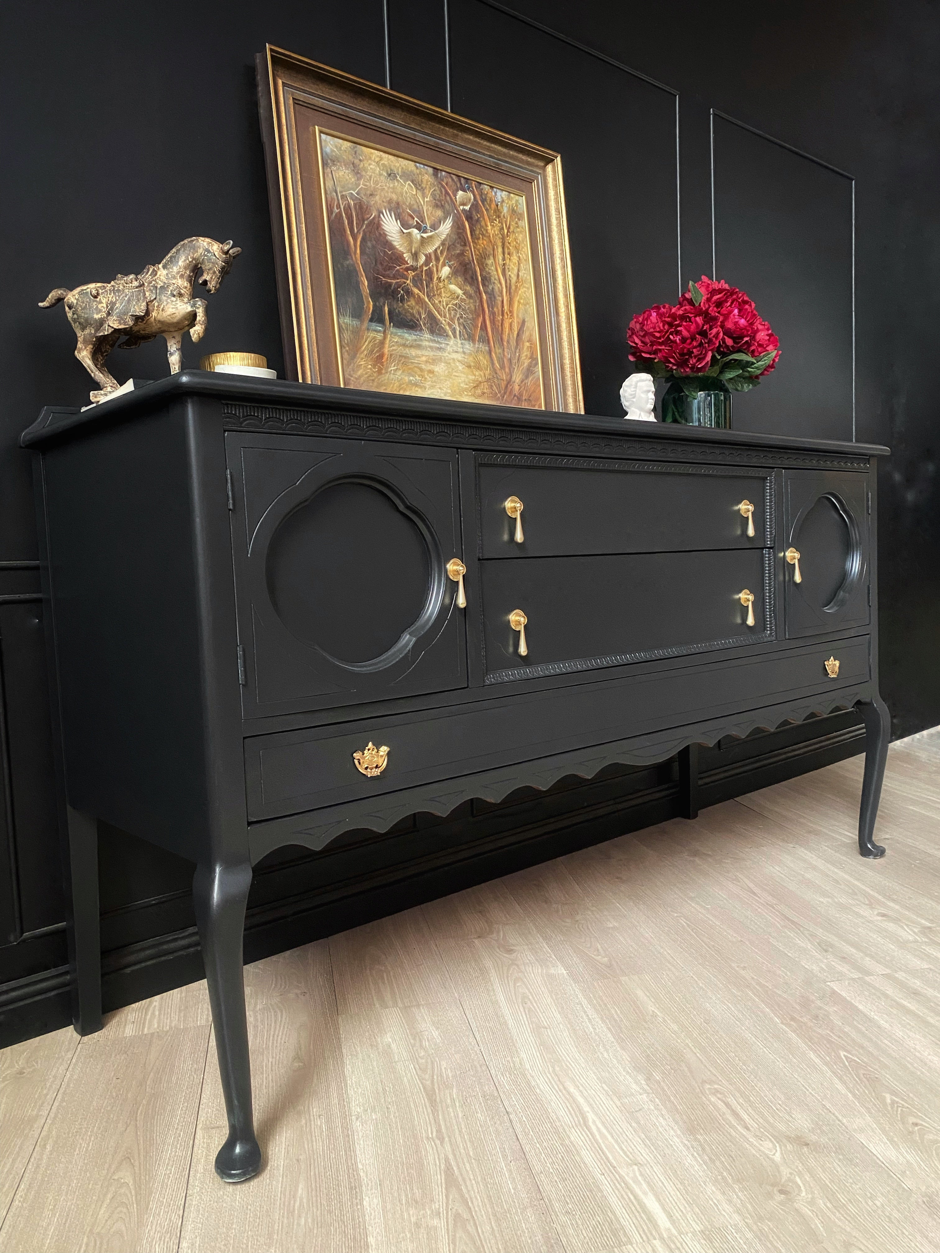 Elegant black sideboard with gorgeous brass drop handles