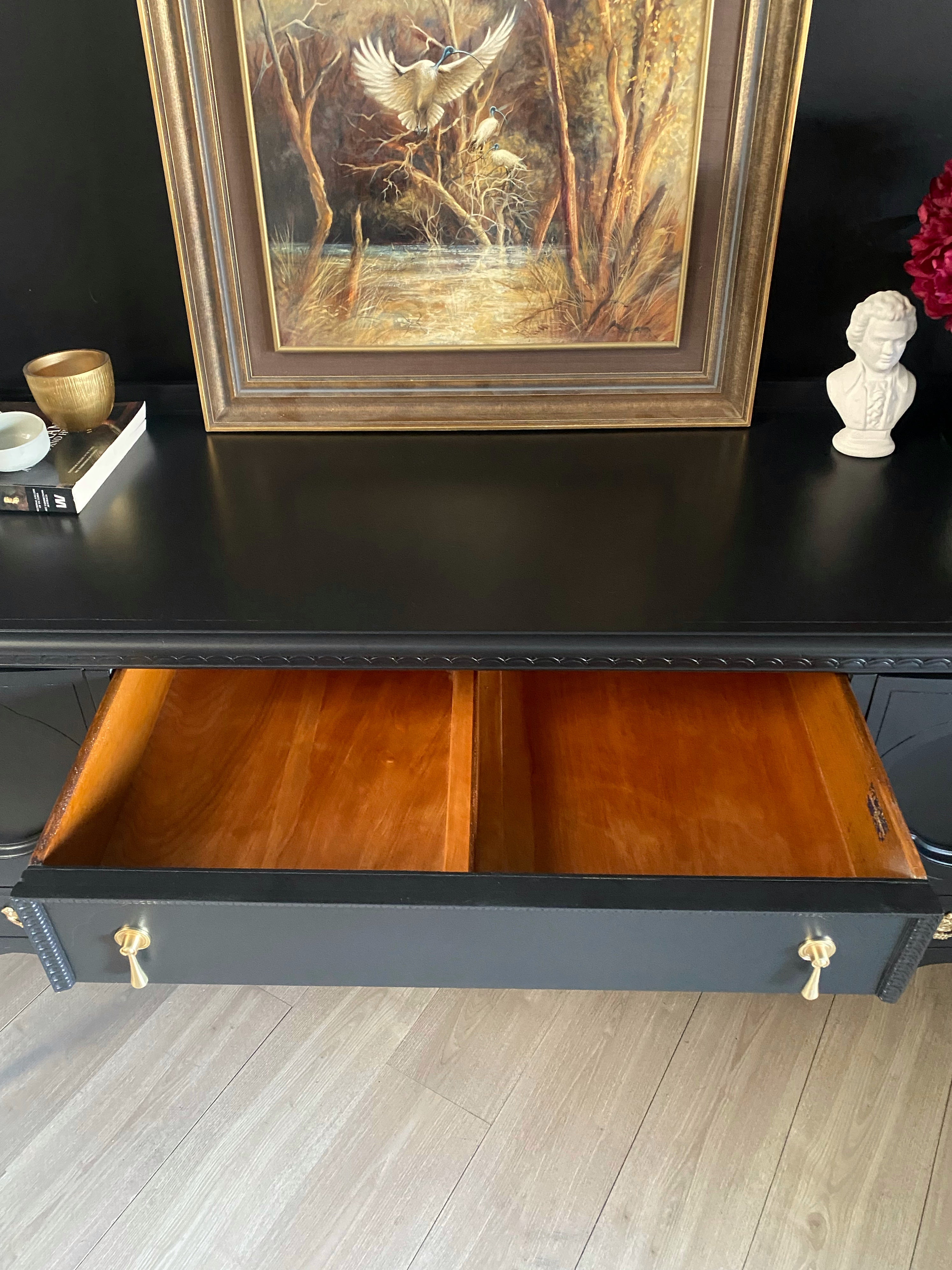 Elegant black sideboard with gorgeous brass drop handles