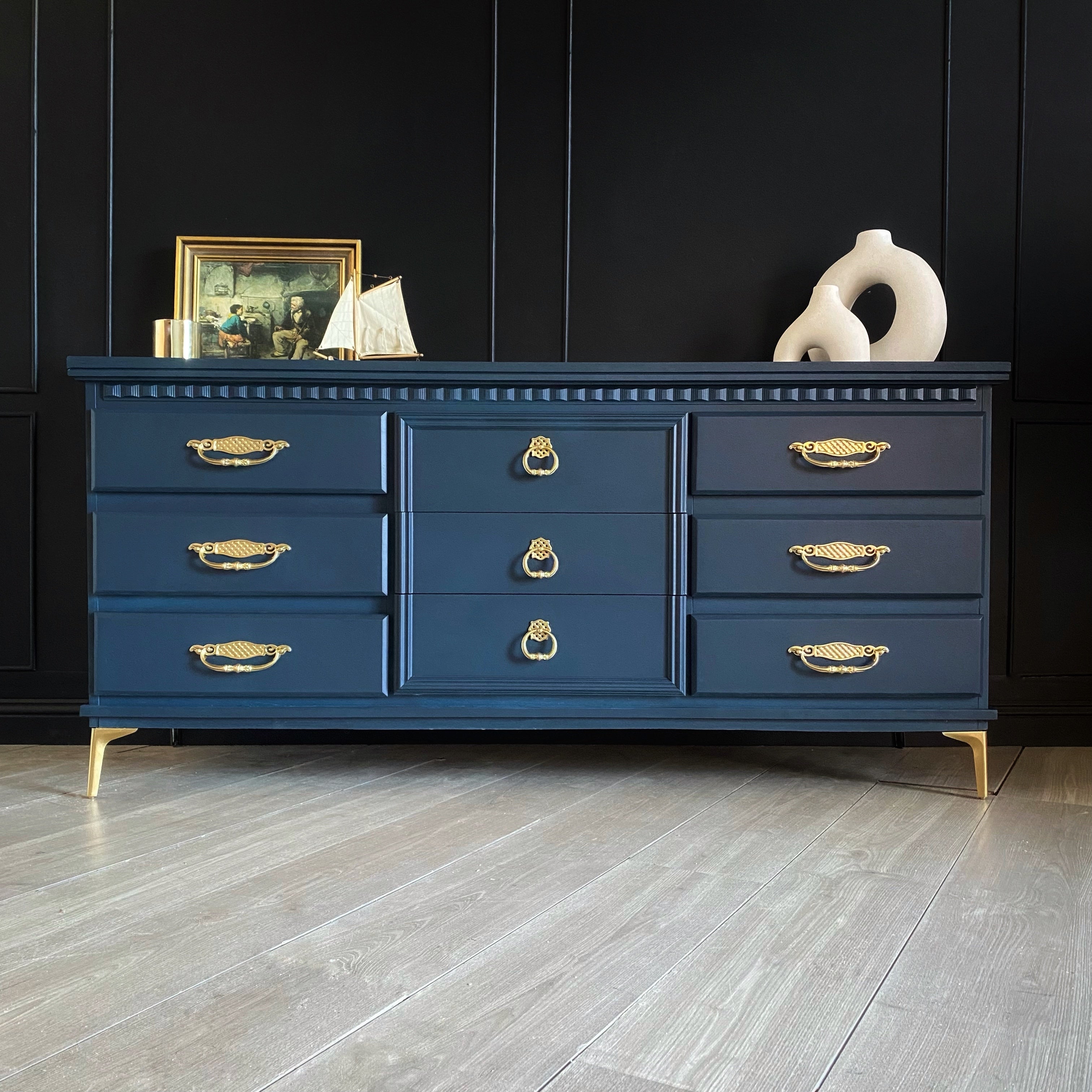 Dark Blue dresser with gold hardware and legs