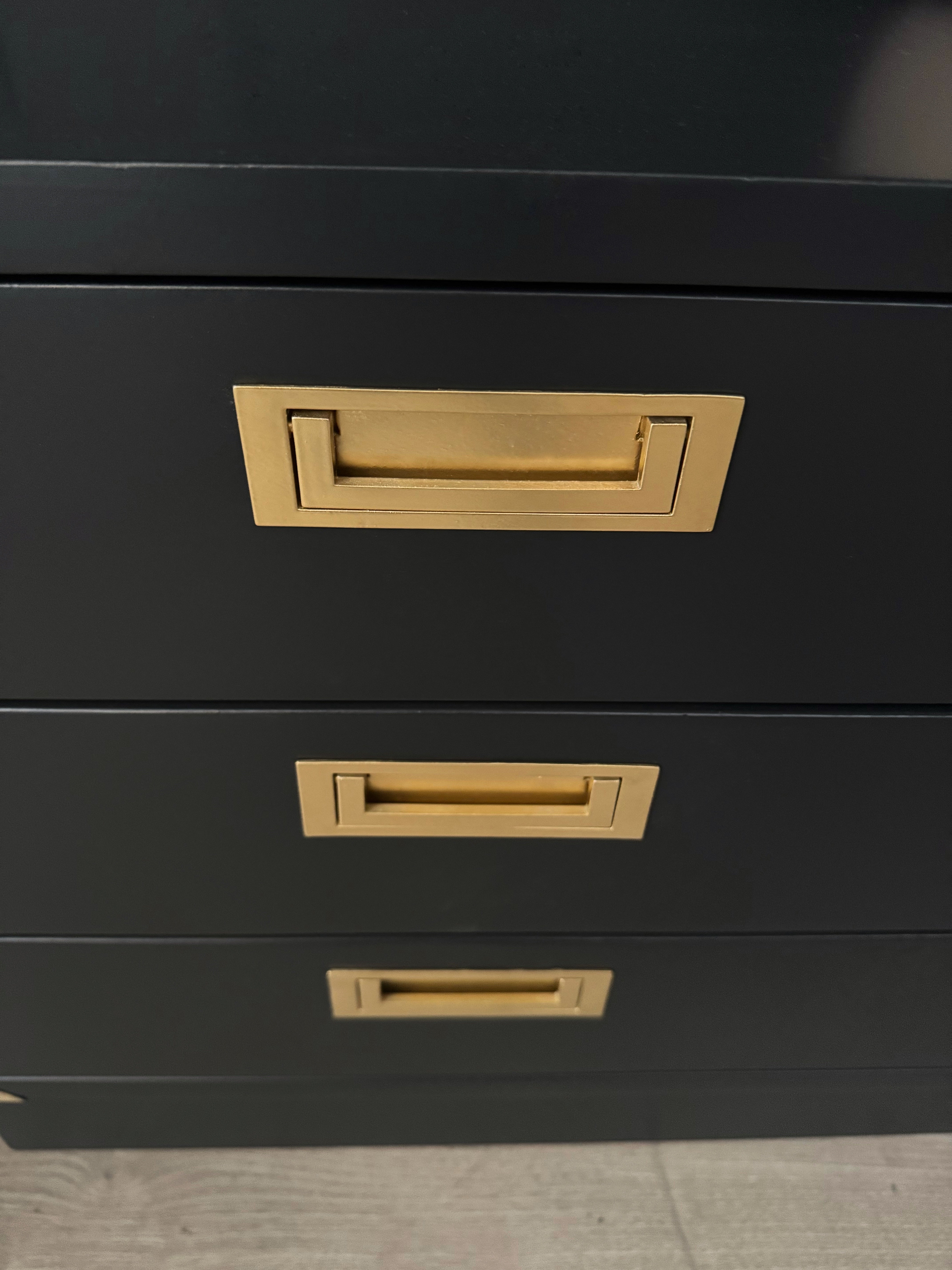 Stunning black and gold detail dresser