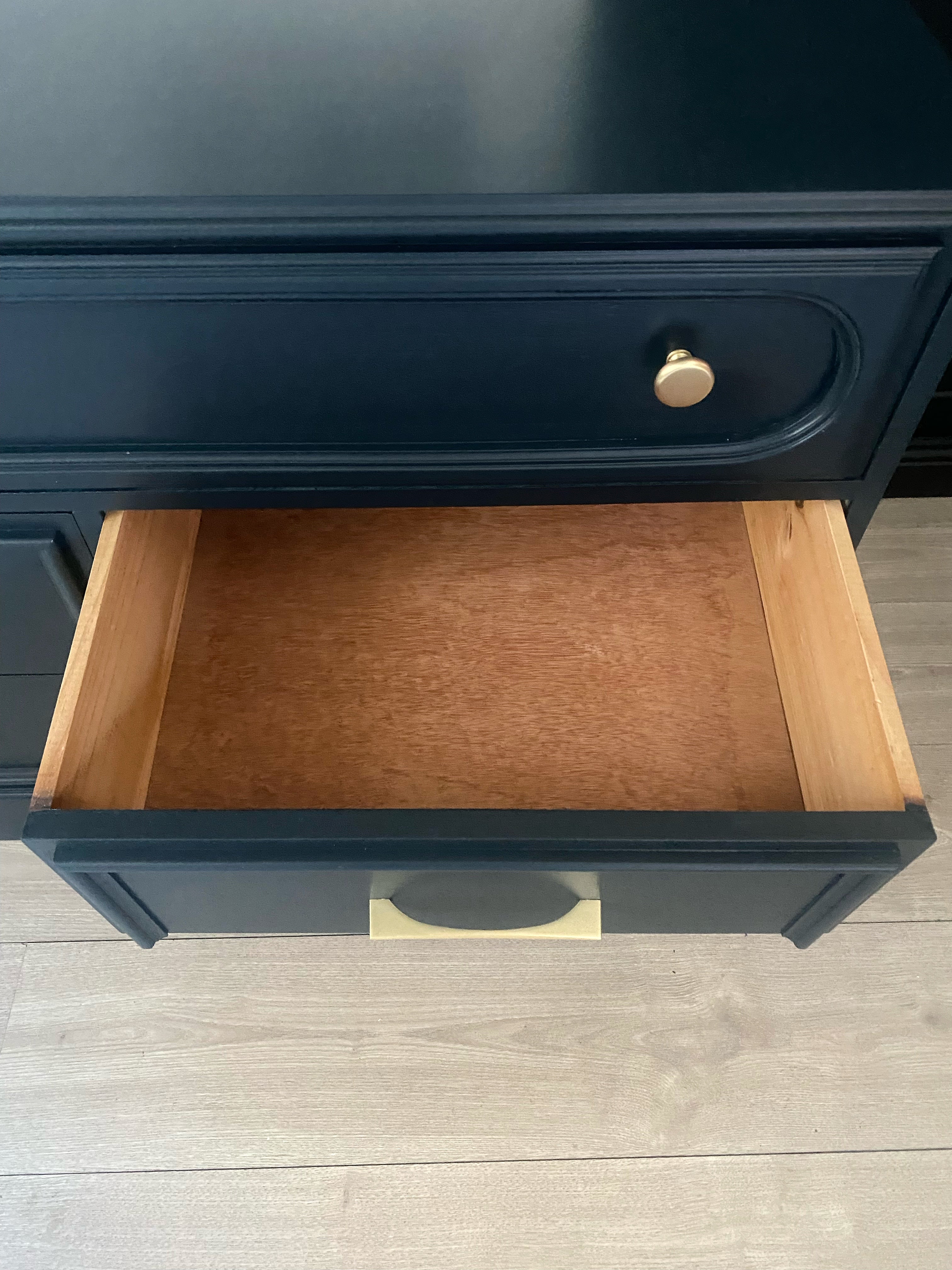 Dark blue 9 drawer dresser with inset brushed brass
