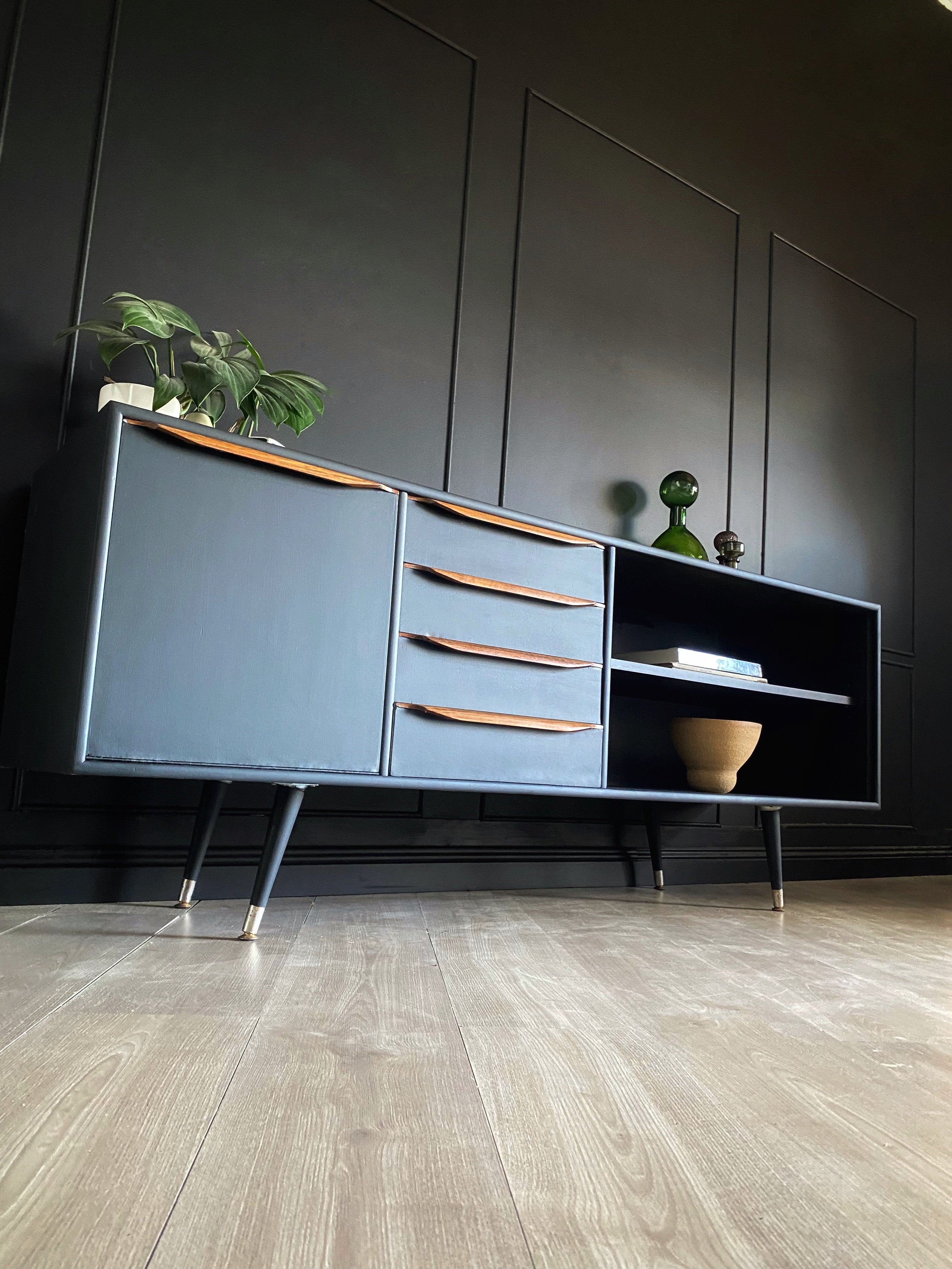 Sophisticated Black Sideboard With Wooden Handles