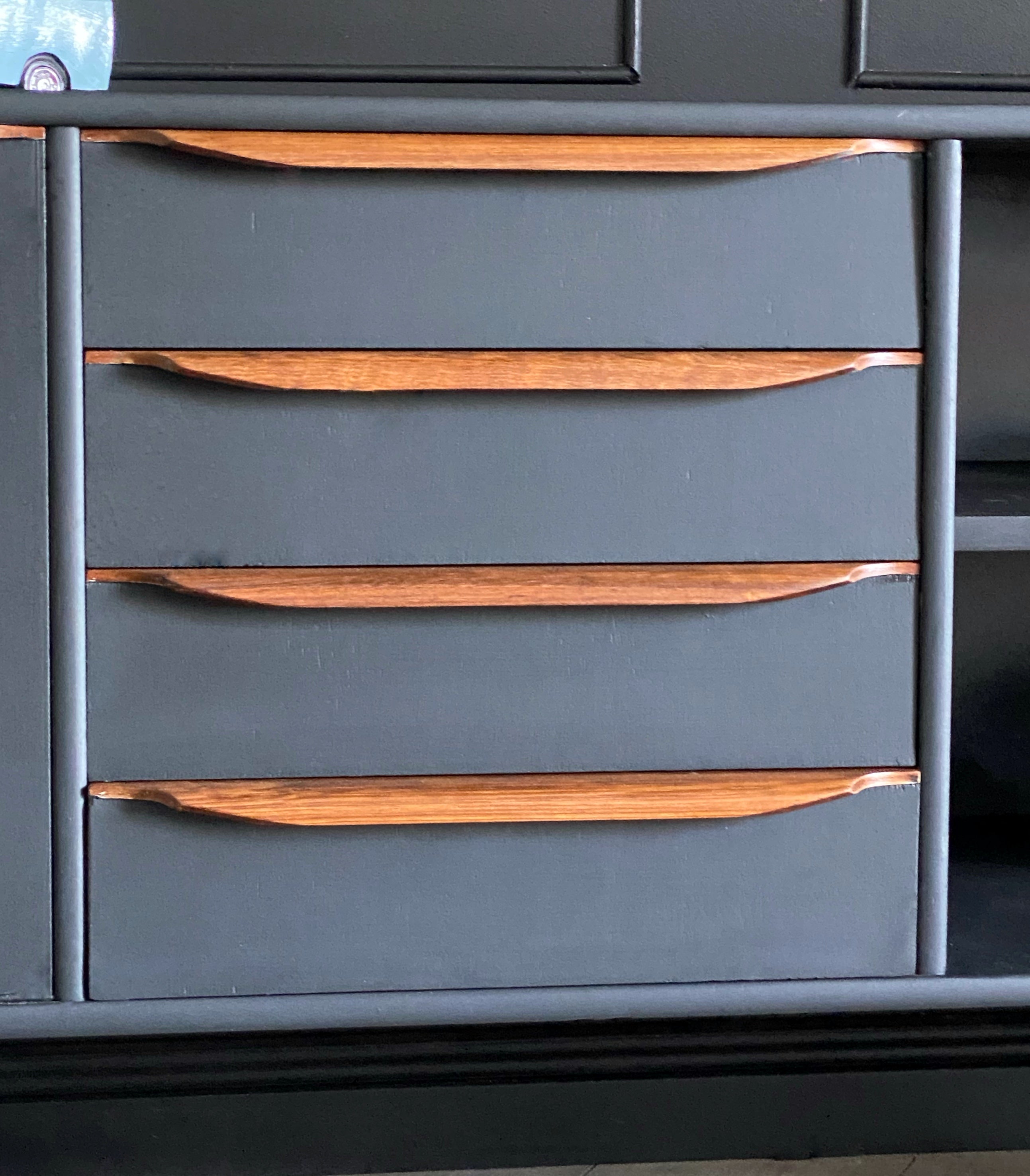 Sophisticated Black Sideboard With Wooden Handles