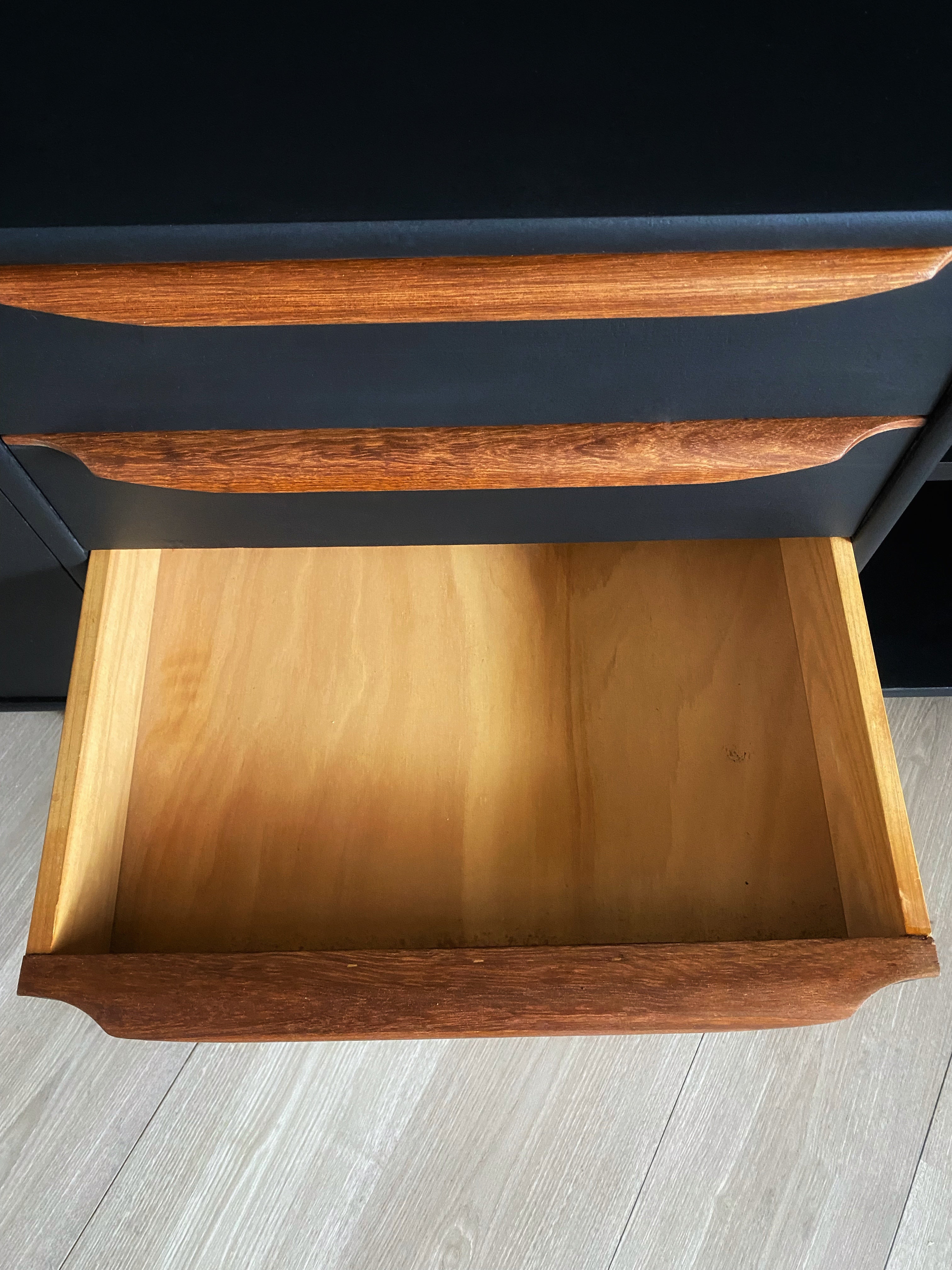 Sophisticated Black Sideboard With Wooden Handles