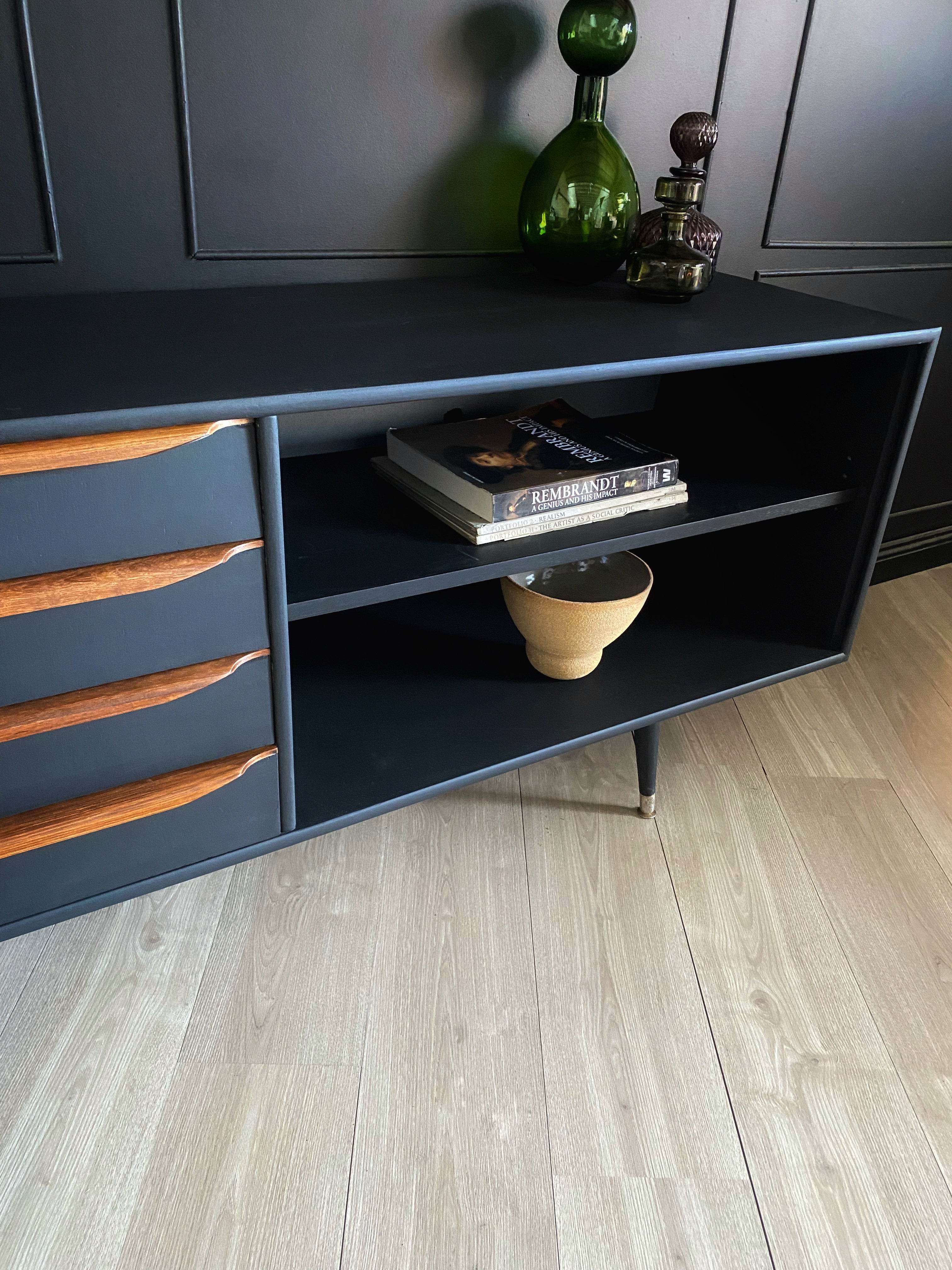 Sophisticated Black Sideboard With Wooden Handles