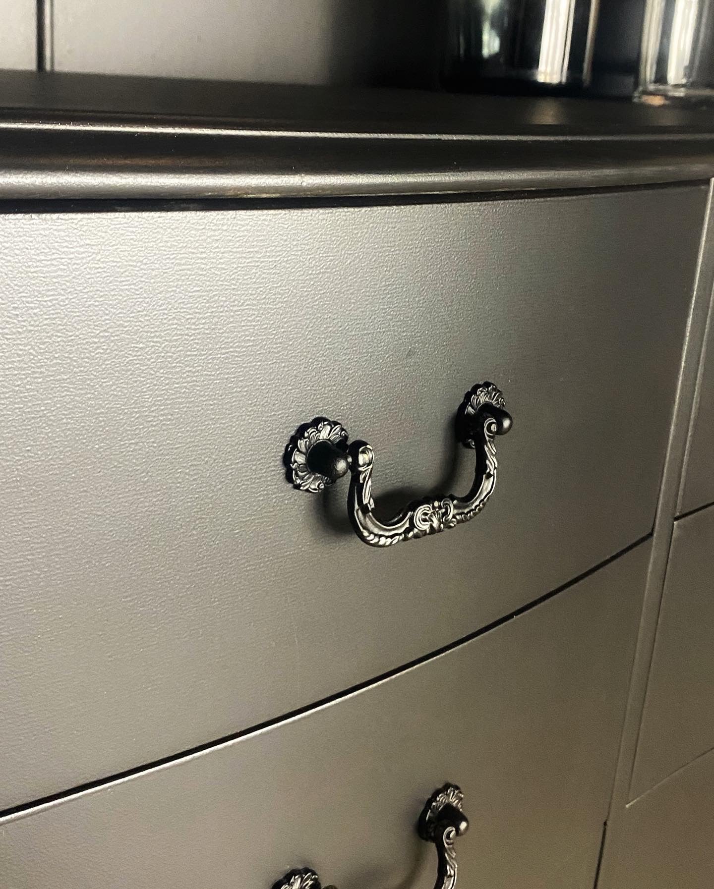 STUNNING BLACK WAVE FRONT DRESSER