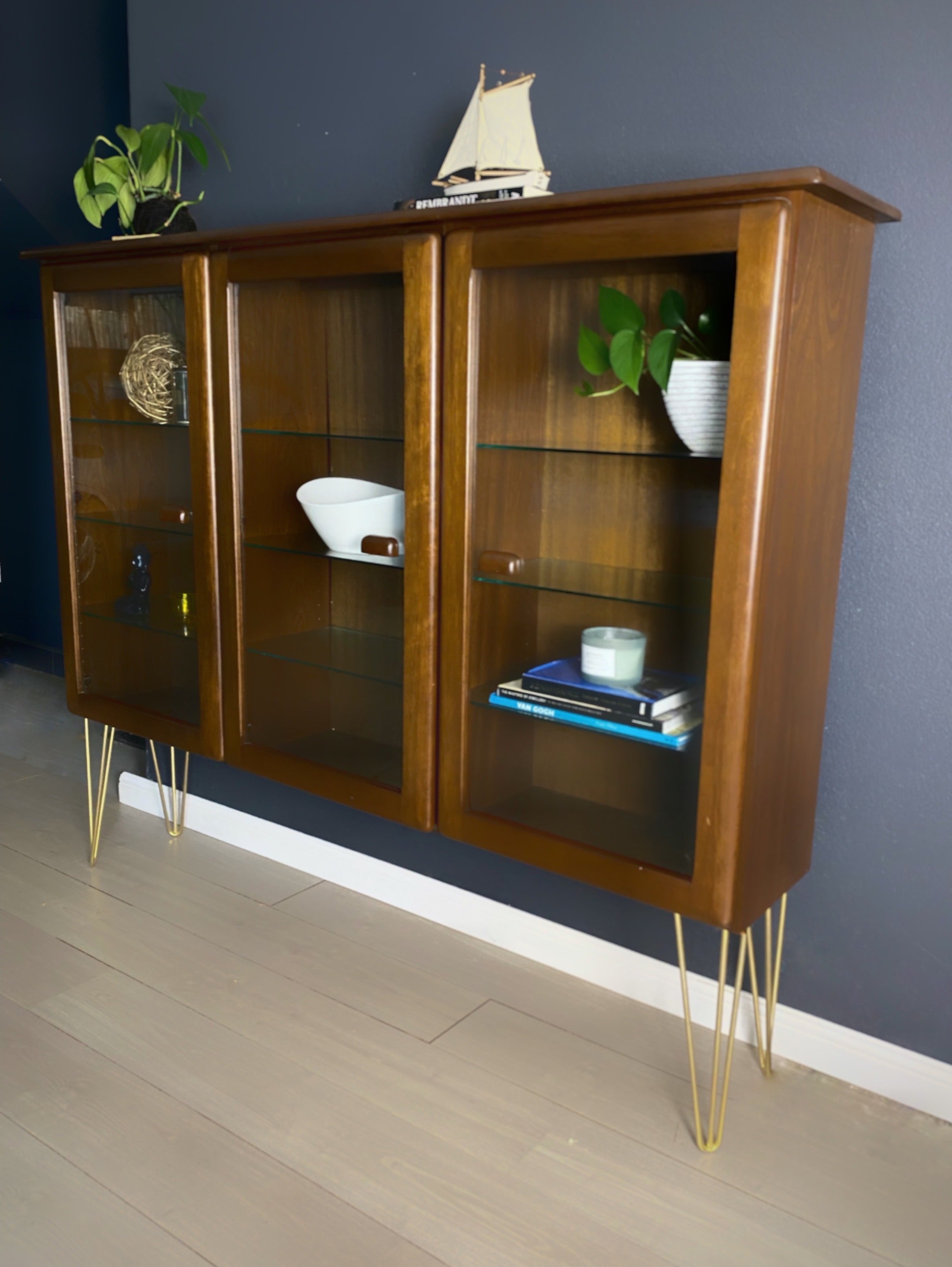 Stylish Mid Century Modern Bookcase with gold legs