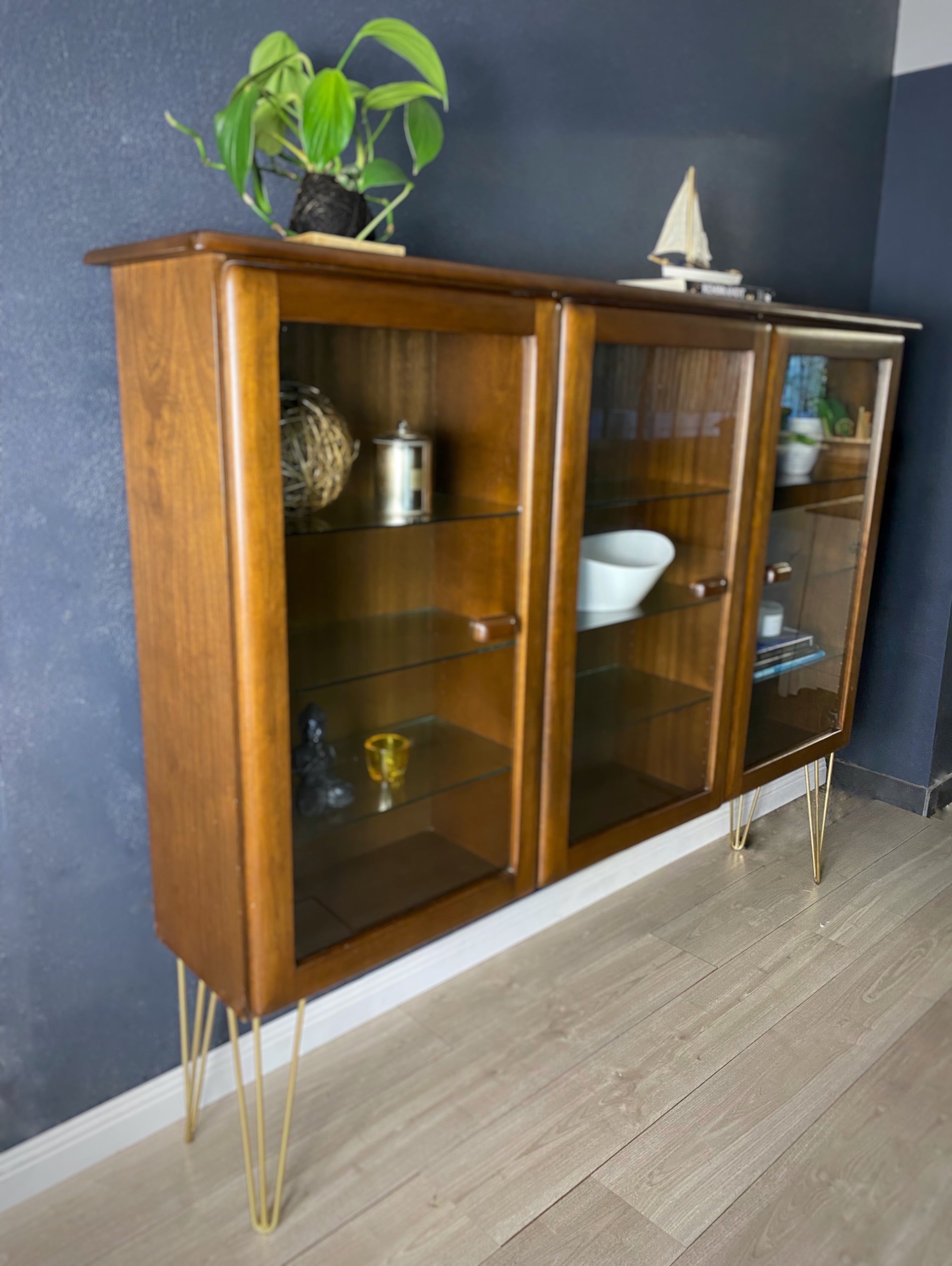 Stylish Mid Century Modern Bookcase with gold legs